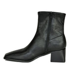 Eralyn Synthetic Stack Heel Boot